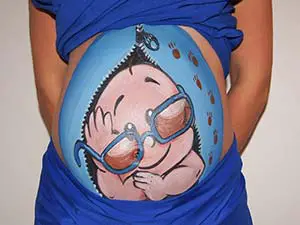 Målning på gravid kvinnas mage 3