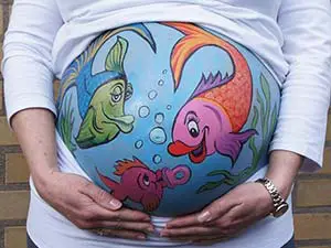 Målning på gravid kvinnas mage 8