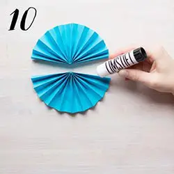 Tillverka en rund pappersrosett själv - Steg 10